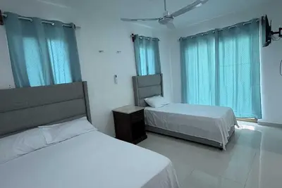 Image de Room with double bed + single bed in Xul-Ha