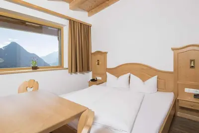 Image de Rooms Alpbach main building - Alpengasthof Hotel Pinzgerhof