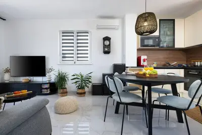 Image de \"Grau\" mit Terrasse by Interhome