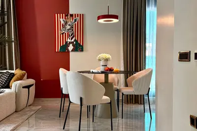 Image de Qoople Eхсellence B-55 neue Wohnung am Meer by Interhome