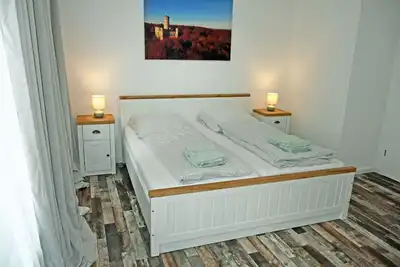 Image de 02 2-room vacation apartment with terrace - Hubertus Vacation Apartments in Sellin, just 500