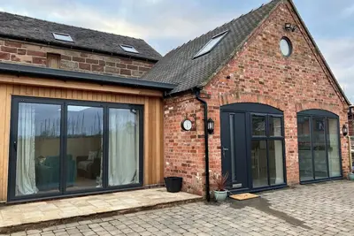Image de Cozy cottage in walking distance to the village and 5 mins from Alton Towers!