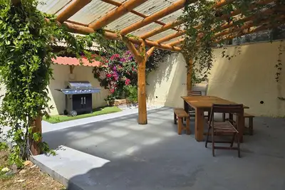 Image de Villa « Appartement avec jardin » avec vue montagne, terrasses privées et climatisation