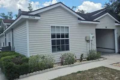 Image de Perfect 3-bedroom condo with Ac, pool, garden near Lake Heron