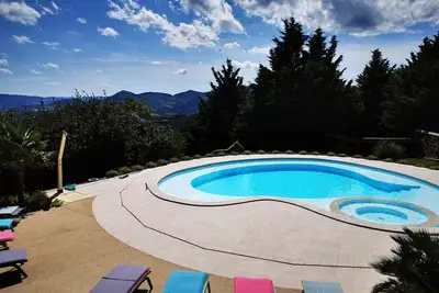 Image de Chalet « Au Domaine De Cabu » avec vue montagne, piscine partagée et Wi-Fi