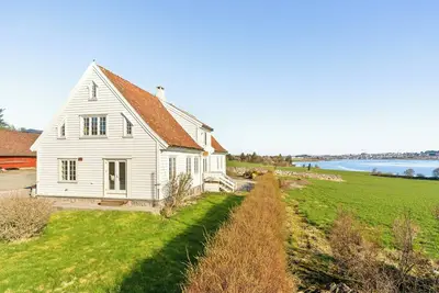 Image de Une maison en bois vieille de 200 ans au bord de la mer à Tananger
