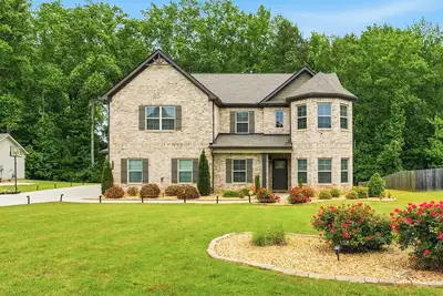 Image de Spacious 5-bedroom house with a king size sofa bed on the 2nd Floor Loft area.