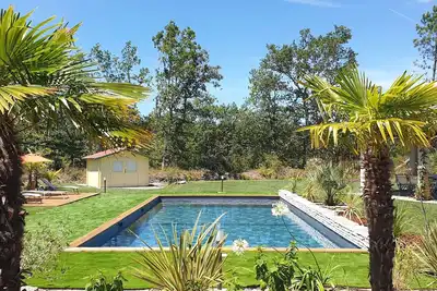 Image de Villa 5 étoiles : Piscine chauffée, 24 pers. , proche lac Parentis-en-Born