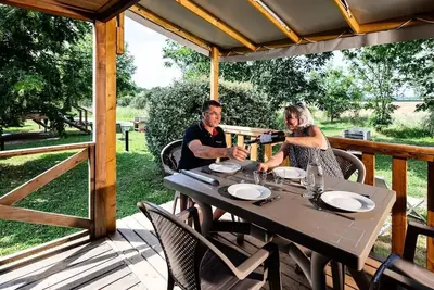 Image de Bungalow 2 Cosy 2 ch - clim - Tv - Bbq - Ménage* -  31m2 + terrasse couverte 4 personnes