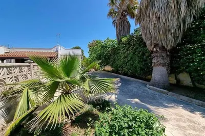 Image de Appartement 'Villa Venere - Terra' avec terrasse privée, jardin privé et climatisation