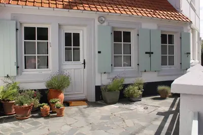 Image de Gîte Le Ressac à Wissant\n2 chambres et un canapé lit double au salon