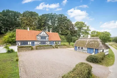 Image de Idyllic country house with own forest in fantastic nature.