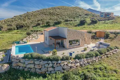 Image de Villa avec piscine à débordement et vue sur Scopello