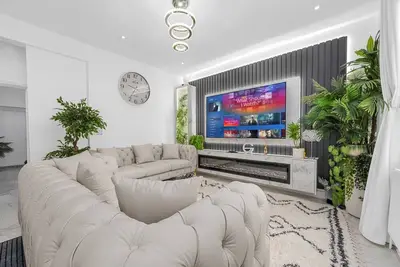 Image de Sluxe Properties, 4mins to etihad stadium and coop Live