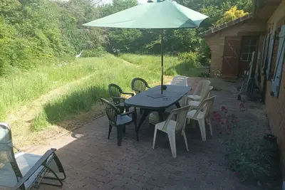 Image de Grande maison dans un écrin de verdure