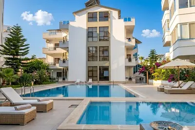 Image de Serene 3-bedroom apartment with olympic pool