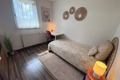 Image de A 10 minutes du Chr! Appartement 3 chambres avec jardin, garage et parking