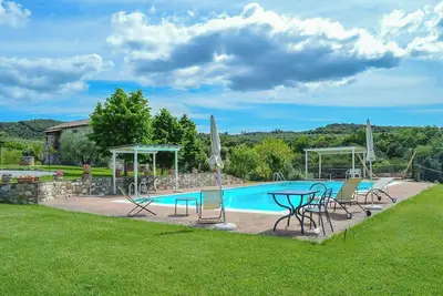 Image de Appartement dans une ferme avec piscine à Asciano
