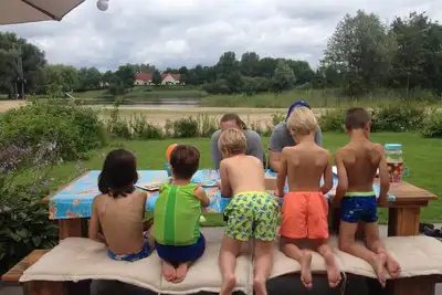 Image de Vrijstaande recreatiewoning direct aan het strand