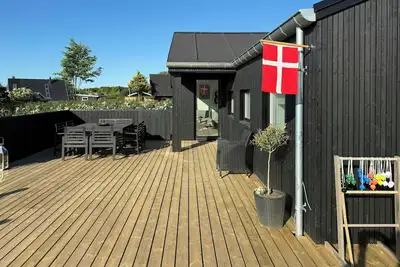 Image de Maison de vacances récemment rénovée avec vue sur la mer à Skåstrup
