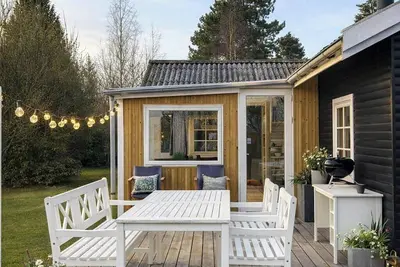 Image de Une petite oasis avec une grande terrasse et un jardin agréable