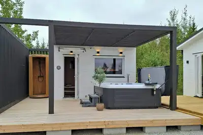 Image de Cottage moderne avec spa près de Barken
