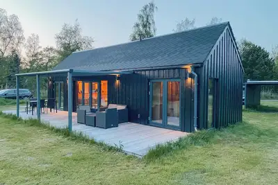 Image de Maison de vacances confortable près de la plage