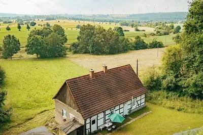 Image de Maison forestière avec sauna en tonneau à l'orée des montagnes de l'Egge