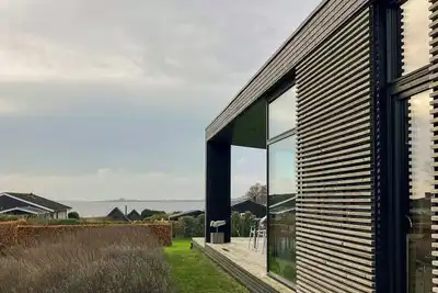 Image de Maison moderne avec vue sur la mer près de Faaborg