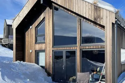 Image de Chalet de montagne moderne avec vue imprenable à Rauland