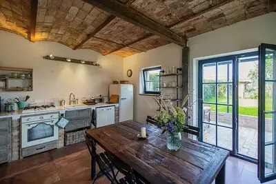 Image de Idylle dans une grange avec vue sur de vastes champs