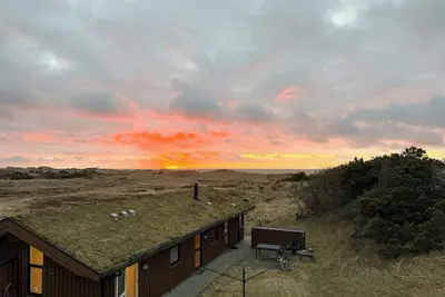 Image de Maison moderne située dans une zone dunaire classée près de Rødhus