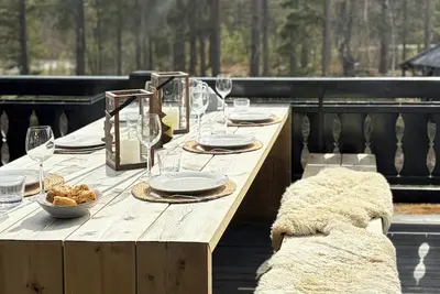 Image de Cabane en bois avec jacuzzi près de la piste de ski de fond