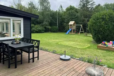 Image de Chalet confortable avec sauna et baignoire extérieure