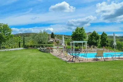 Image de Appartement avec piscine dans une maison en pierre toscane près d'Asciano