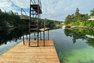 Image de Maison de vacances au bord de la mer à Tvedestrand avec balcon
