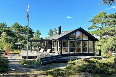 Image de Chalet familial avec baies vitrées à Oksrødkilen