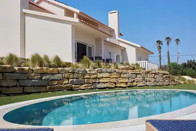 Image de Villa Stipa-Modern villa with private pool near Praia Grande, golf & surf spots.