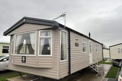 Image de Caravane moderne de 3 chambres près de la plage du parc de vacances Ty Mawr