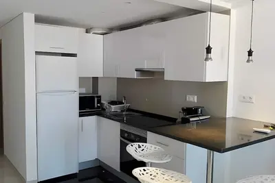 Image de Appartement 'T1 Av Ténis' à Albufeira avec vue mer, climatisation et parking