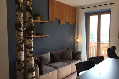 Image de Appartement de vacances avec vue sur la montagne et Tv