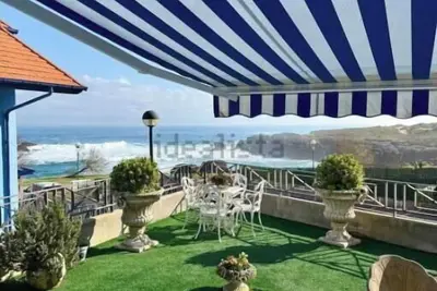 Image de Beachfront Apartment with Private Garden in Playa de Ris, Noja