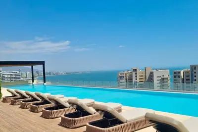 Image de Coastal 1-bedroom apartment Near the Beach w/ Infinity Pool