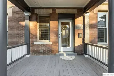 Image de Omaha Luxury Brownstone! 1 King, 3 Queens with Garage!