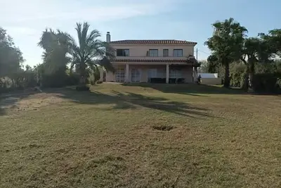 Image de Ginjol Sunset Beachfront Cottage
