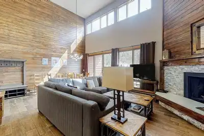 Image de Water-view escape near the slopes with mountain vista, balcony, & fireplace