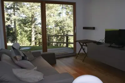 Image de Bel appartement avec Wifi, bain à remous, Tv, patio, animaux admis et vue panoramique