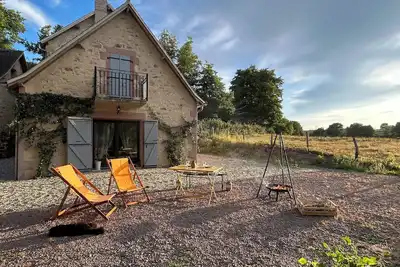 Image de chambre au moulin de Tilly, dans le bocage bourbonnais, idéal pour se ressourcer!