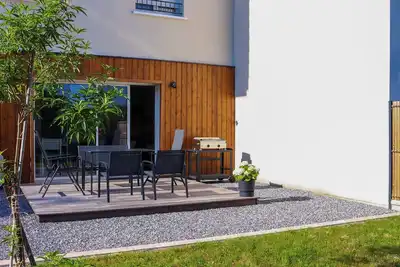Image de Maison neuve climatisée, tout confort, idéale pour familles et entre amis.