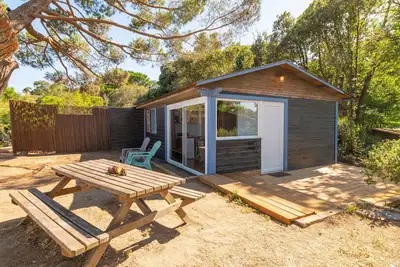Image de Chalet Dune Sud avec vue sur la mer et terrasse privée.